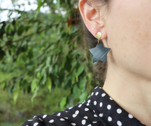 Dana - Black Star Earrings on Gold Posts